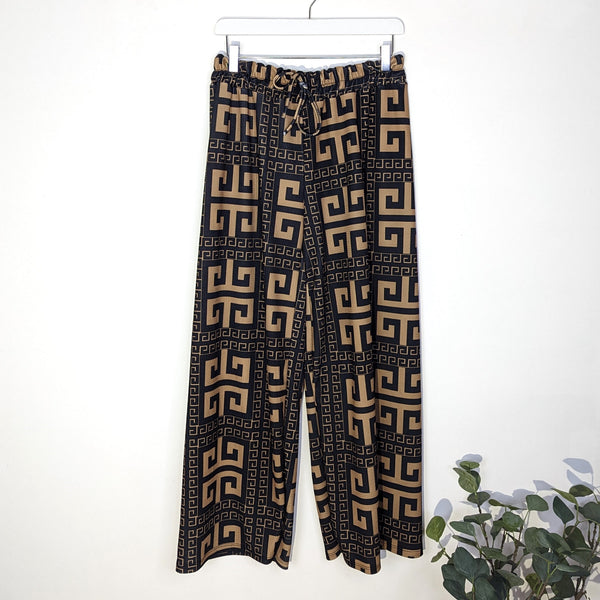 'Givenchy' style enlarged logo print straight leg elasticated waist trousers