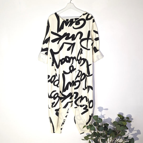 Hi-lo smart dress with pockets and graffiti style handwriting print and zip detail down back