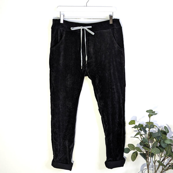 Stretchy corduroy velvet type fabric trousers (M-L)