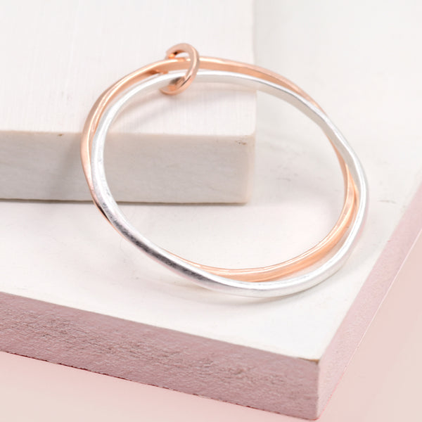 Silver bangles with rose gold link