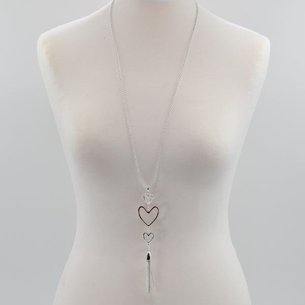 Triple heart pendant with tassel feature long necklace