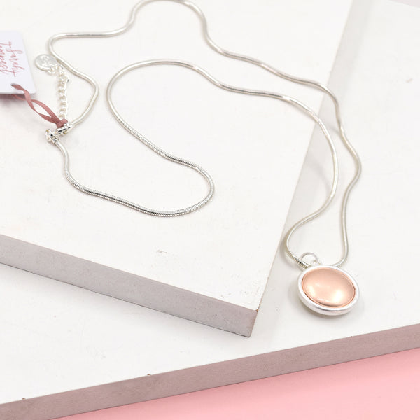 Orb shaped pendant on long chain necklace