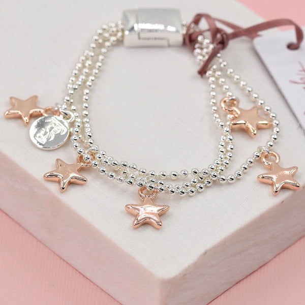 Triple strand bracelet with star charms