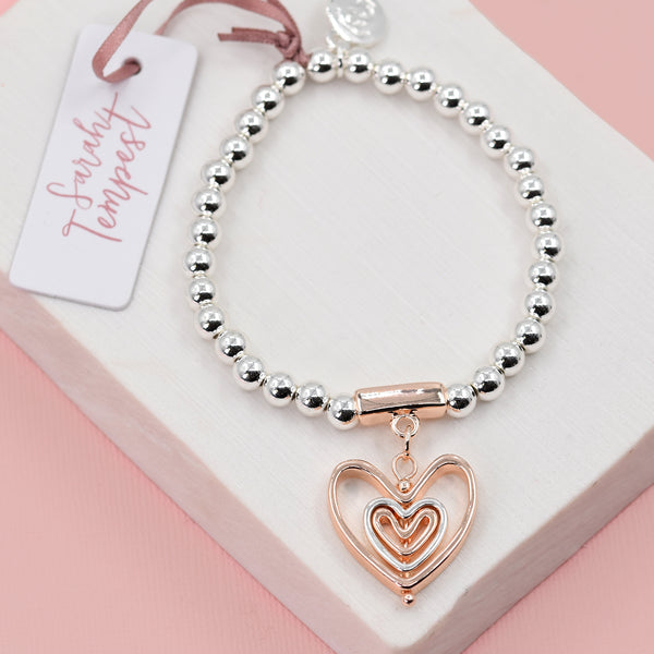 Double heart hanging charm beaded bracelet