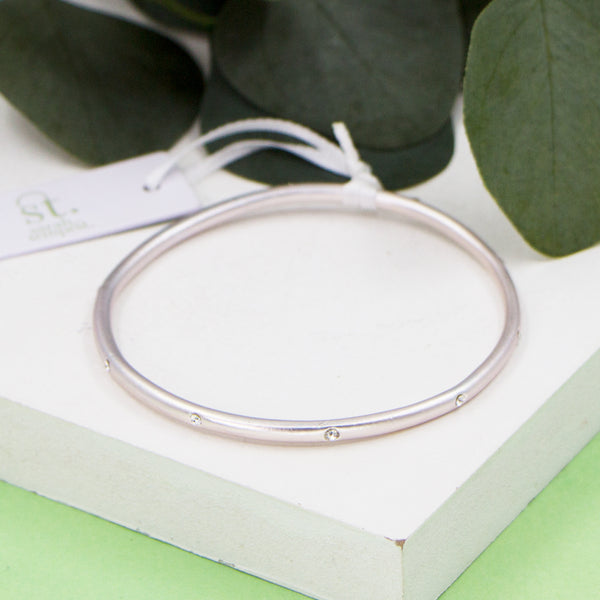 Matte silver bangle with crystals