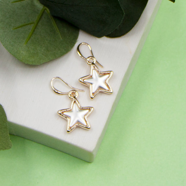 Rose gold fish hook star charm earrings with matte silver inlay