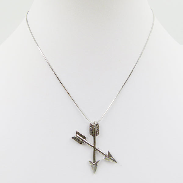 Crosed arrows pendant on delicate snake chain