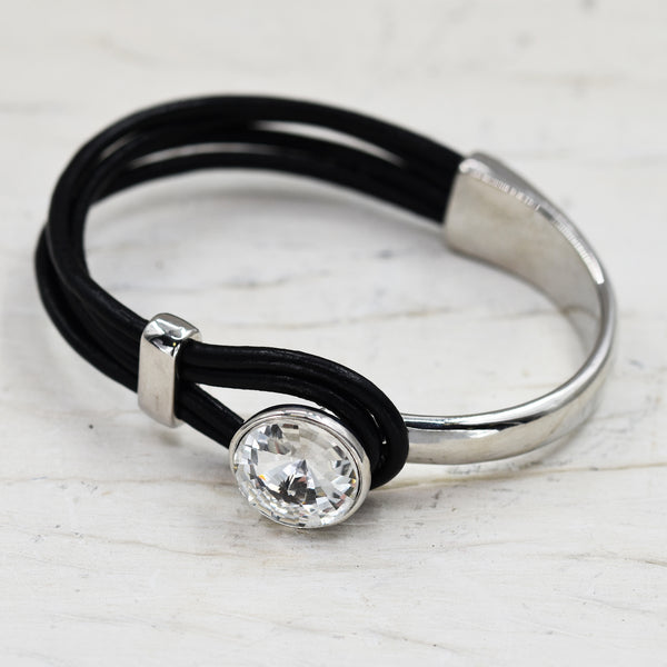 Leather bangle with central crystal stone clasp feature