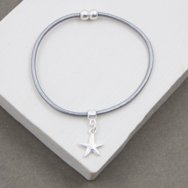 Simple delicate leather bracelet with single star