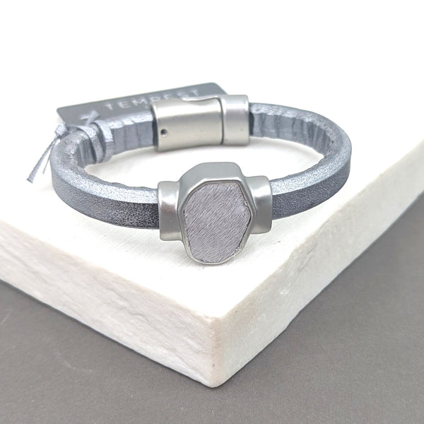 Simple metallic leather bracelet with horse hair inlay feature