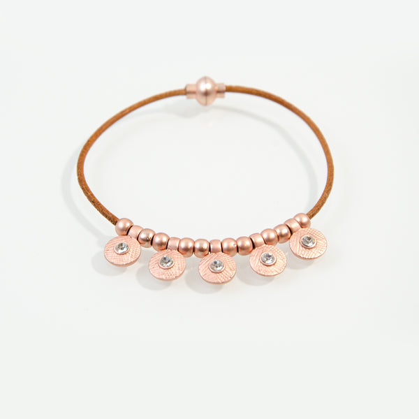 Five disc bracelet with beads on leather