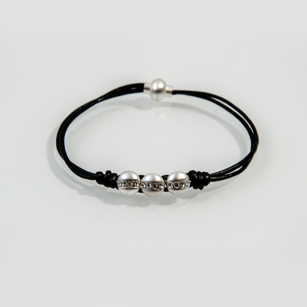 Triple bead detail with crystal on leather bracelet