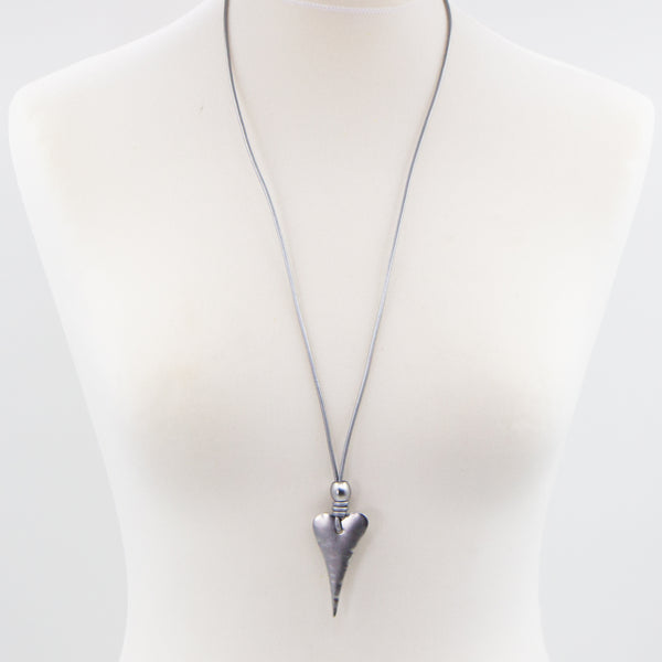 Elongated heart on long leather necklace