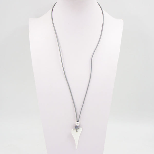 Elongated heart on long leather necklace