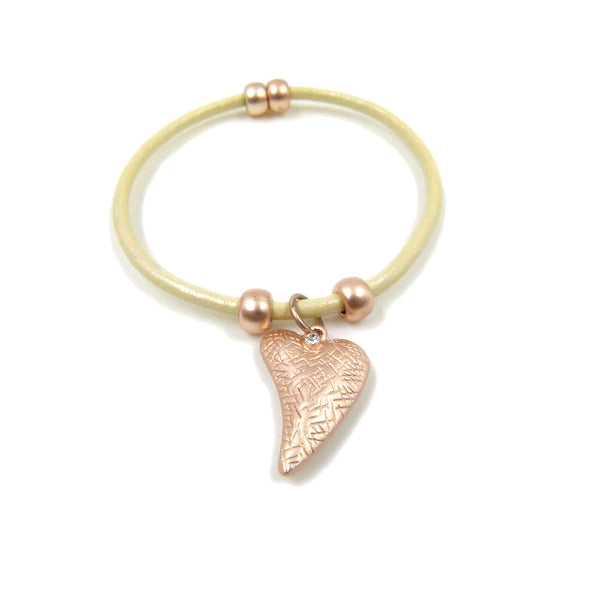 Heart pendant on simple leather bracelet with magnetic clasp