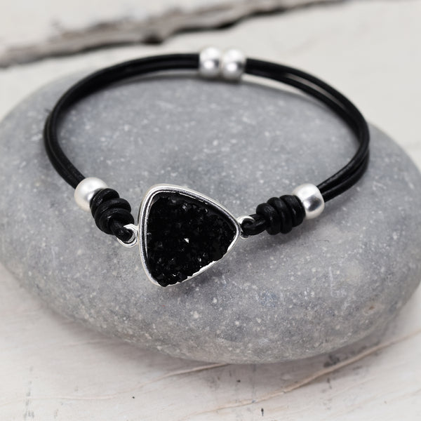 Multi crystal triangle feature bracelet on simple leather