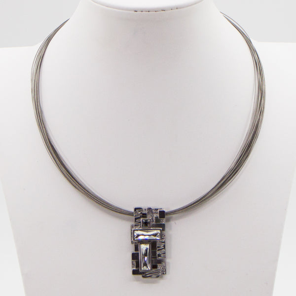 Retro style pendant w/feature crystals on multistrand wire