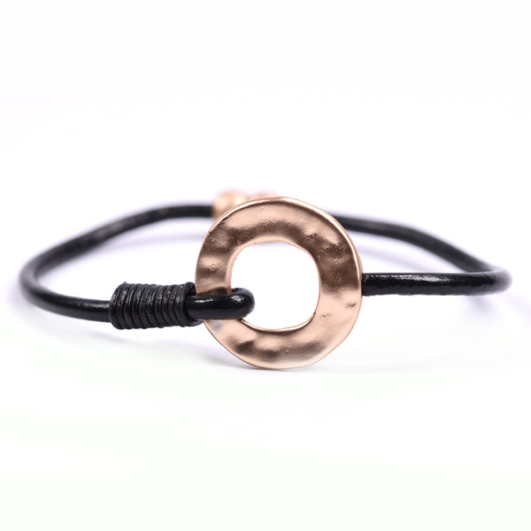 Simple circle detail on single cord leather bracelet