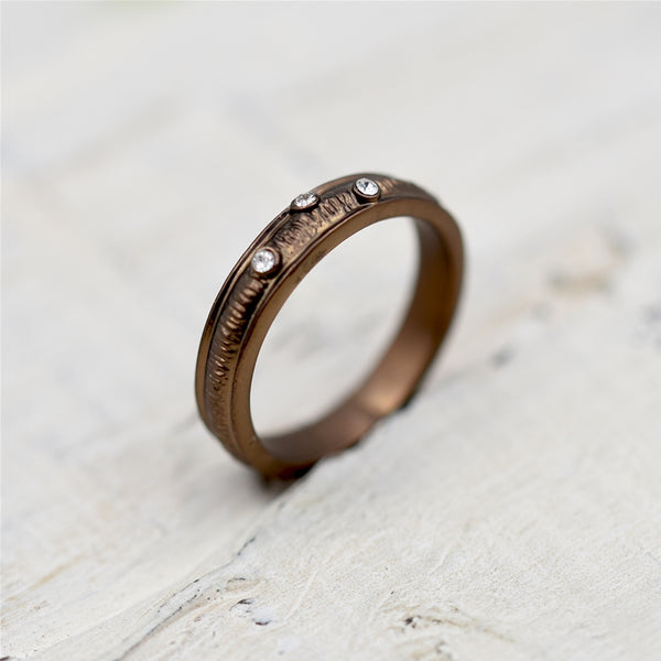 Simple ridged ring with delicate crystal detail