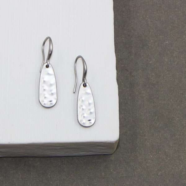 Mottled surface fish hook earrings