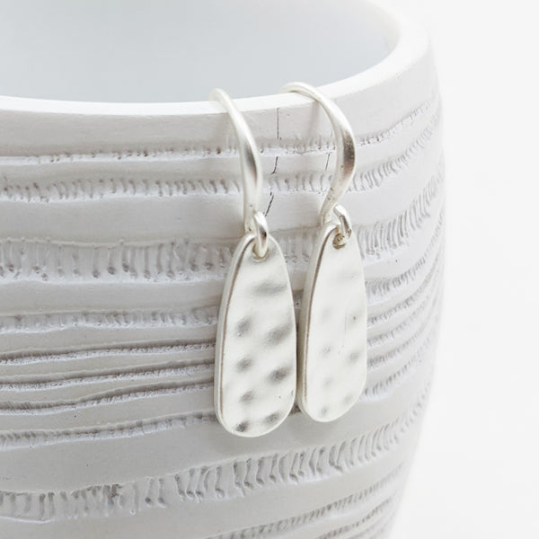 Mottled surface fish hook earrings