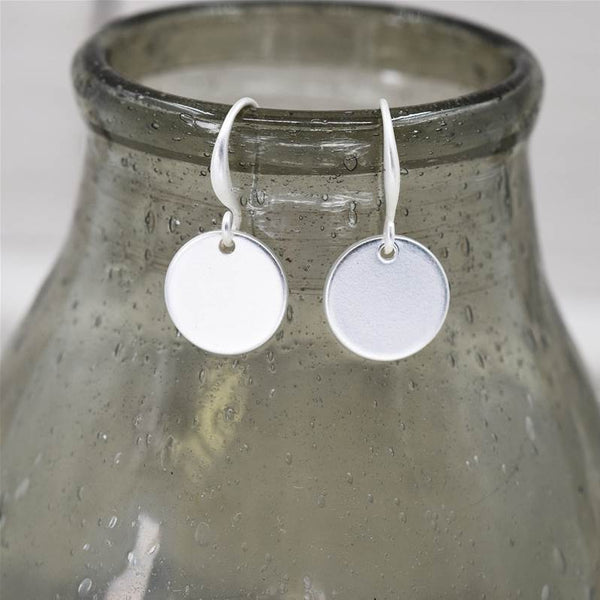 Matte silver disc drop earrings