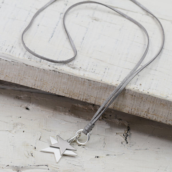 Silver suede necklace with star pendants