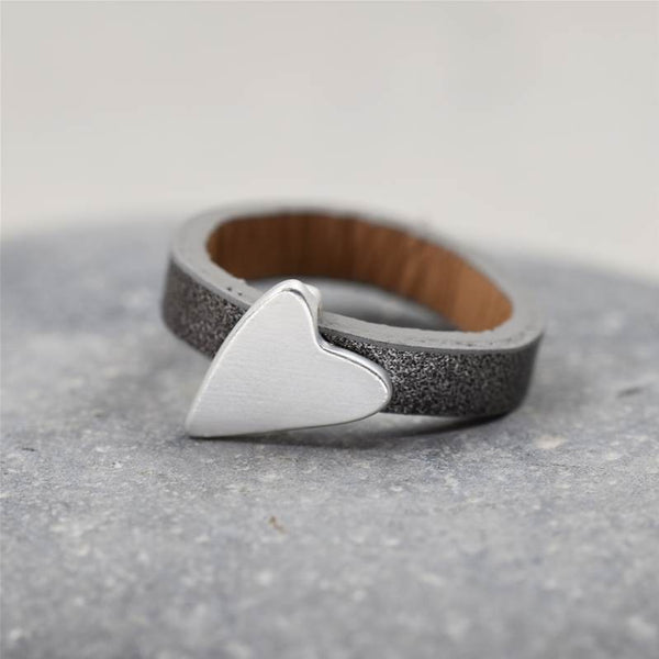 Triple layered grey ring with matte silver heart charm