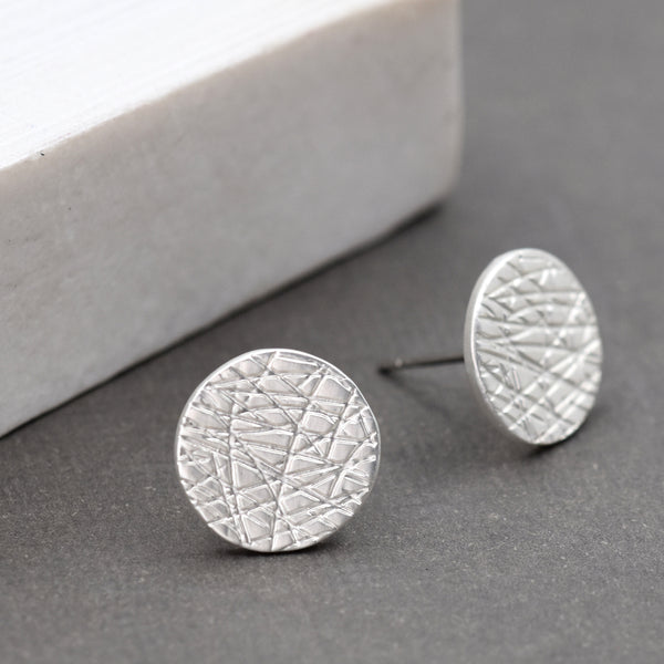 Scratched disc stud earrings