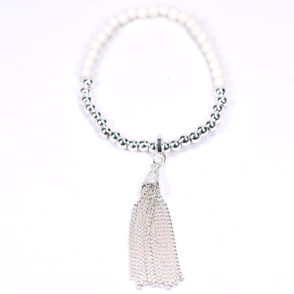 Beaded bracelet with chain tassel