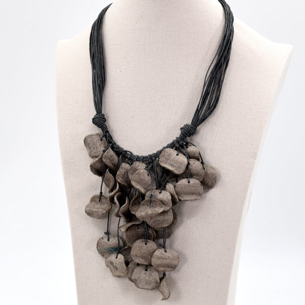 Multi strand twine statement necklace with recycled round wavy paper components