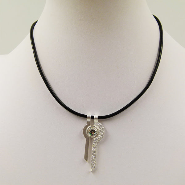 Key style pendant with crystal on short leather necklace