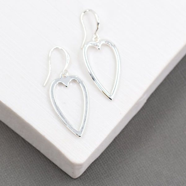 Elongated cut out heart drop earrings