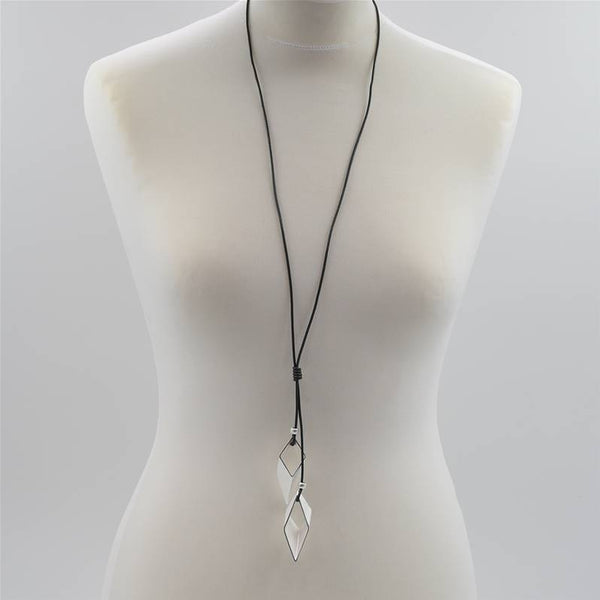 Twin geometric shapes on long leather necklace