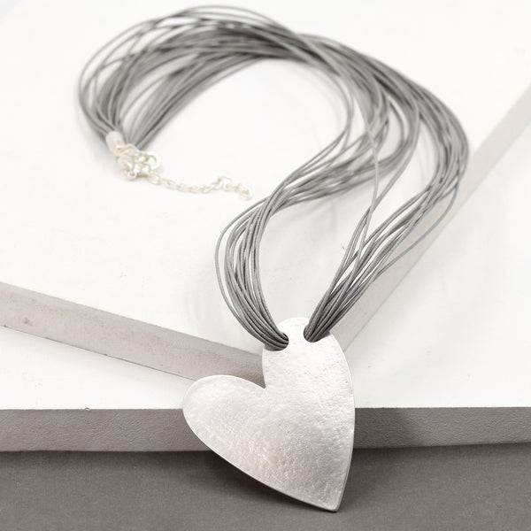 Multi strand necklace with soft hammered heart shaped pendant?